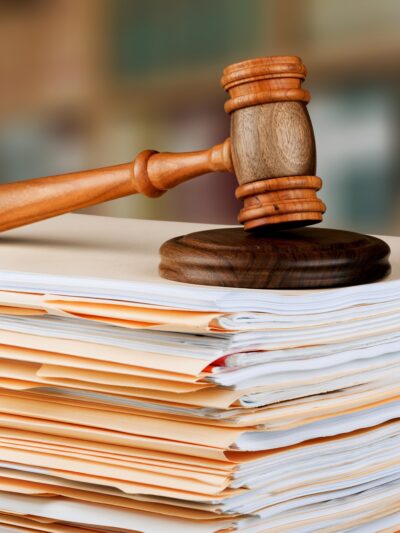 stack of bills with gavel