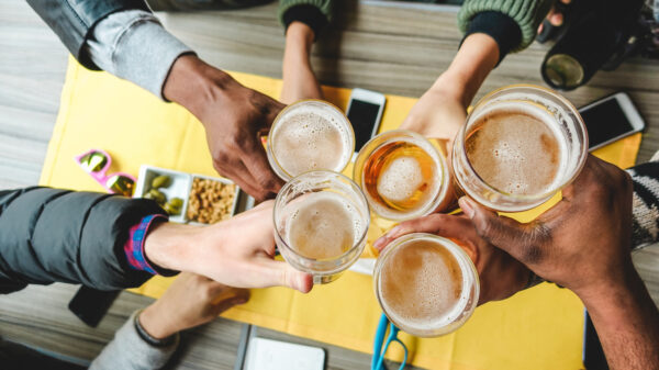 people holding drinks