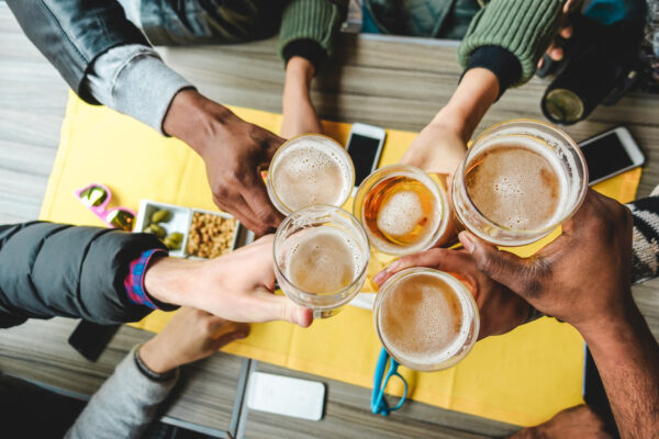 people holding drinks