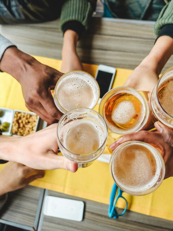 people holding drinks