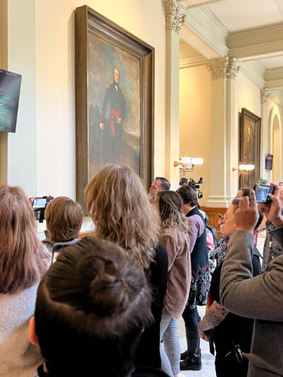 LGBTQ+ allies at the Georgia state capitol reacting to the passage of Senate Bill 140 on March 21, 2023