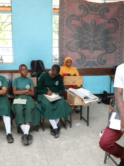 Former fellow Ally Seif Ramadhani teaching students enrolled in his new youth grassroots program, the KIRANJA Project.