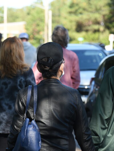people waiting in line to vote