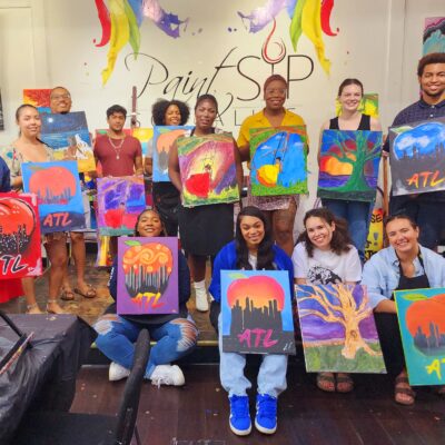 ACLU of Georgia staff with interns at paint and sip event in 2023