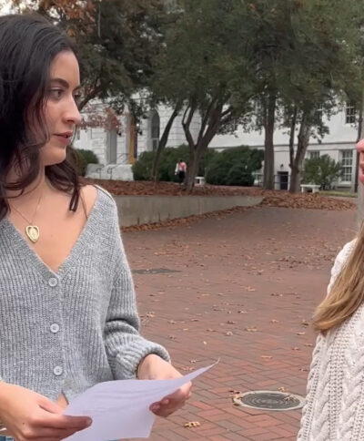ACLU of Georgia comms intern Lena Bodenhamer filming on an Altanta college campus