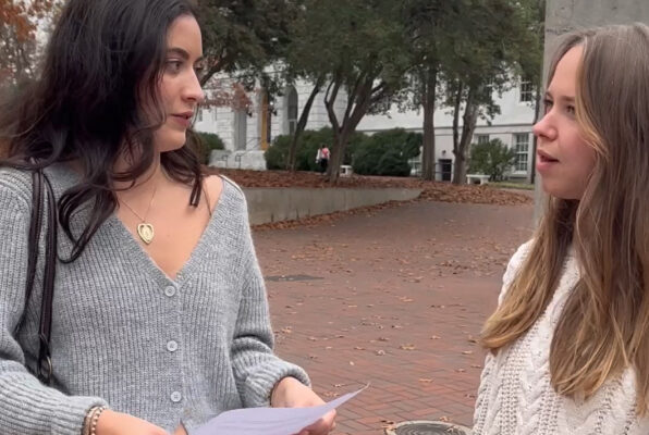 ACLU of Georgia comms intern Lena Bodenhamer filming on an Altanta college campus