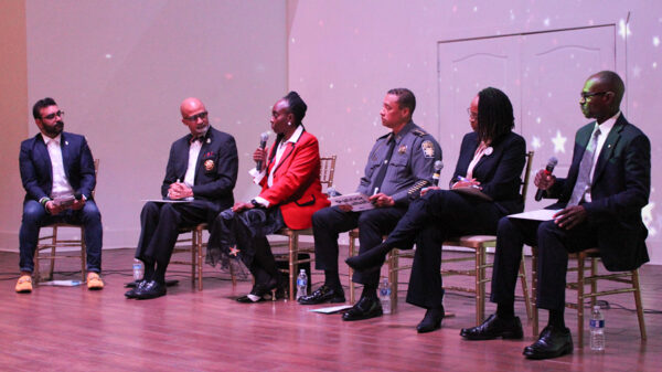 Know Your Sheriff Town Hall, photo of candidates and moderator