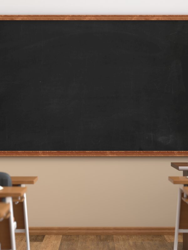 classroom with desks facing chalkboard