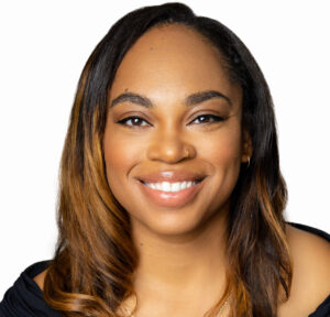 headshot of woman with black shirt