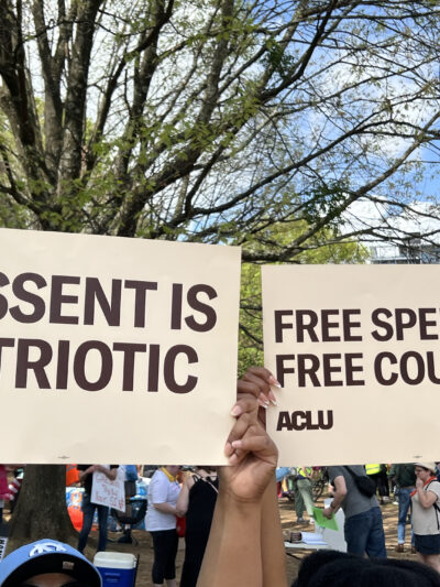 People holding protest signs