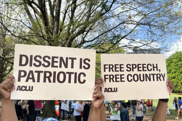 People holding protest signs
