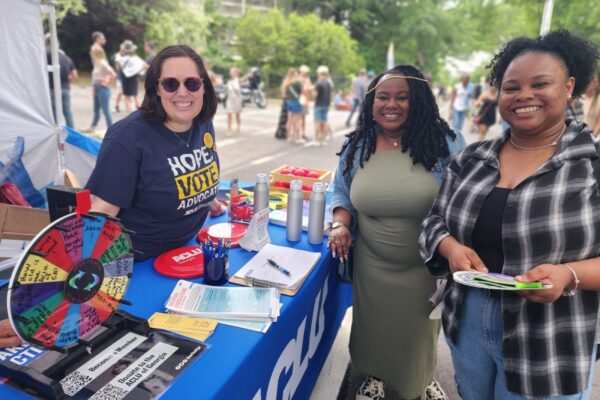 ACLU Georgia volunteersand supporters  smiling at a festival