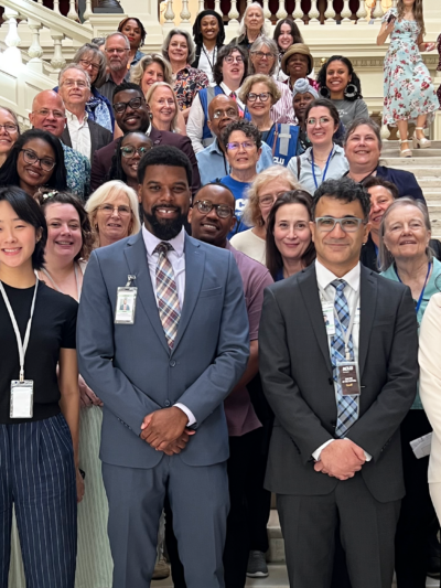 ACLU of Georgia staff, interns and volunteers posing for a group photo following end of session advocacy at the capitol, April 2026.