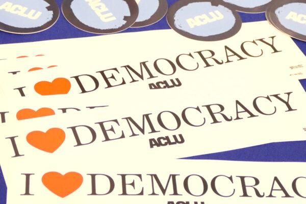 ACLU bumper sticker that reads "I heart democracy."