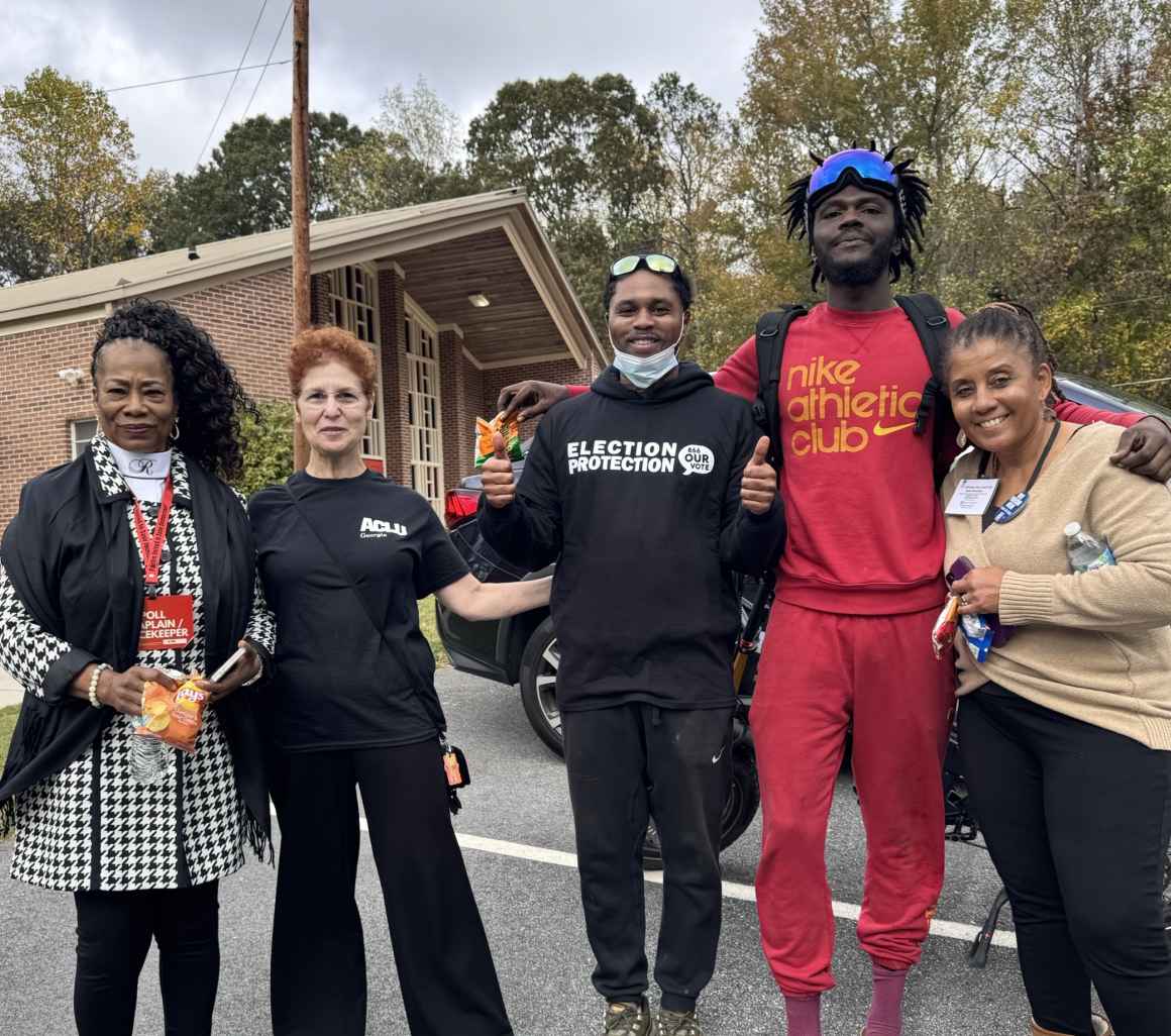 election volunteers standing outside