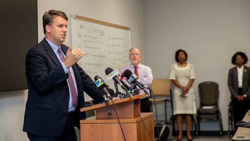 Daniel White, the attorney for the Cobb County elections department, speaks at a press conference Monday, Nov. 7, 2022, to address absentee ballots that were requested but never mailed. The office is sending out absentee ballots to voters who did not receive them and a judge is allowing the county to count those ballots postmarked by Election Day and received by Nov. 14. (Jenni Girtman for The Atlanta Journal-Constitution)