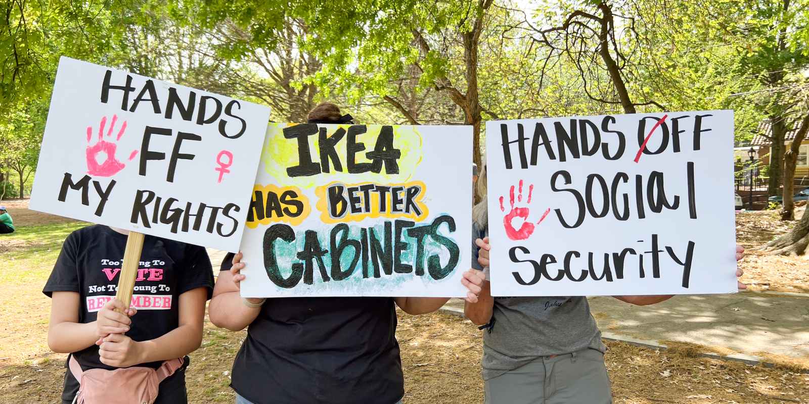Protest signs at Piedmont Park