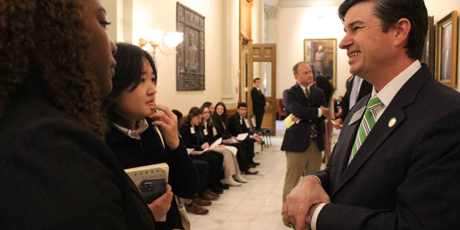 Students speaking with Sen. Matt Brass on Student Lobby Day