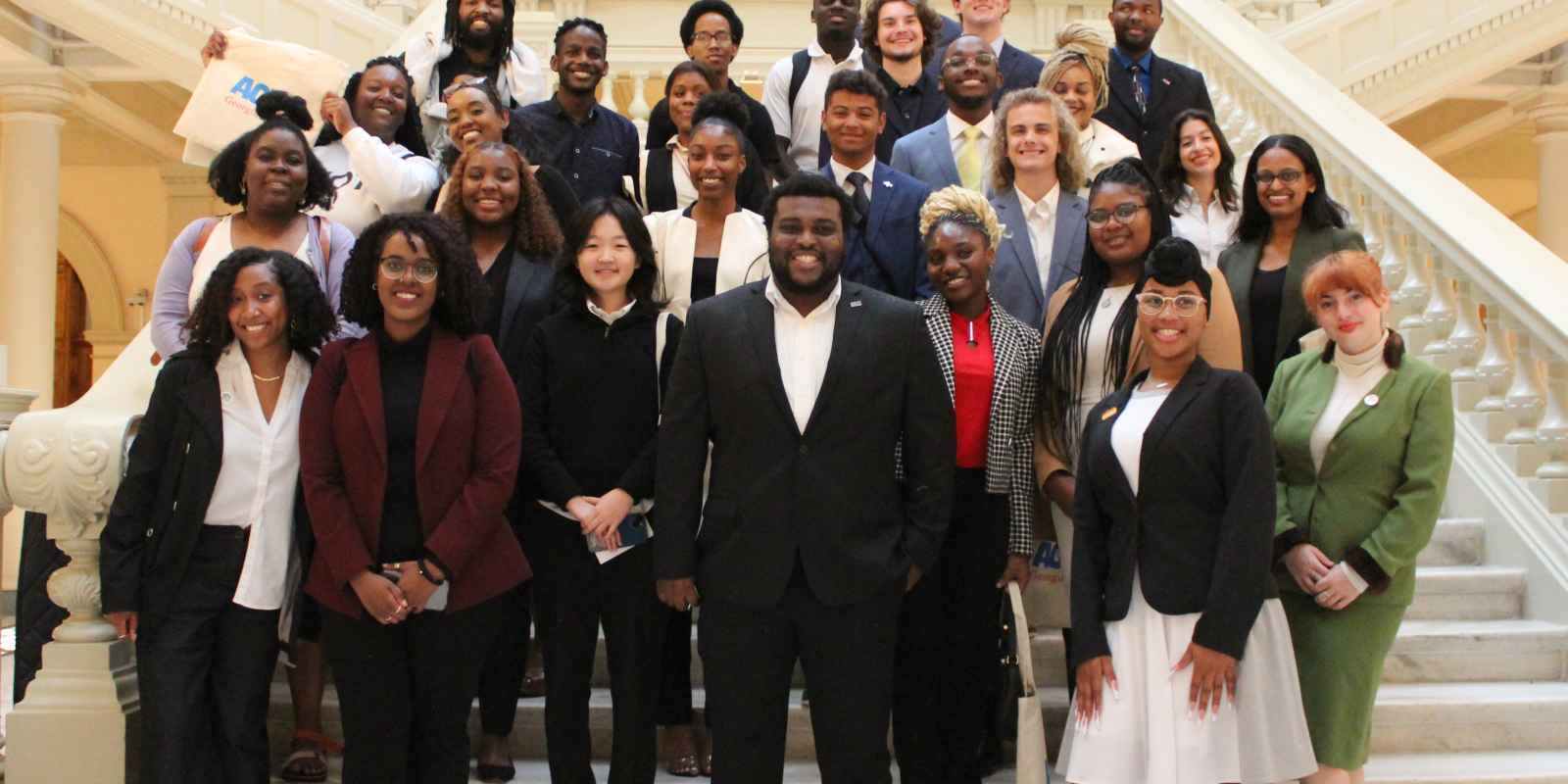 Group photo of students on the steps of the Georgia Capitol on Student Lobby Day 2023