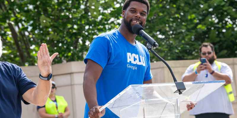 No Kings ACLUGA Policy Director Chris Bruce in front of rally