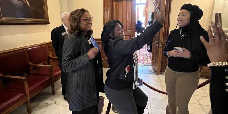 Supporter snapping selfie with lawmaker at Constitution Day 2024