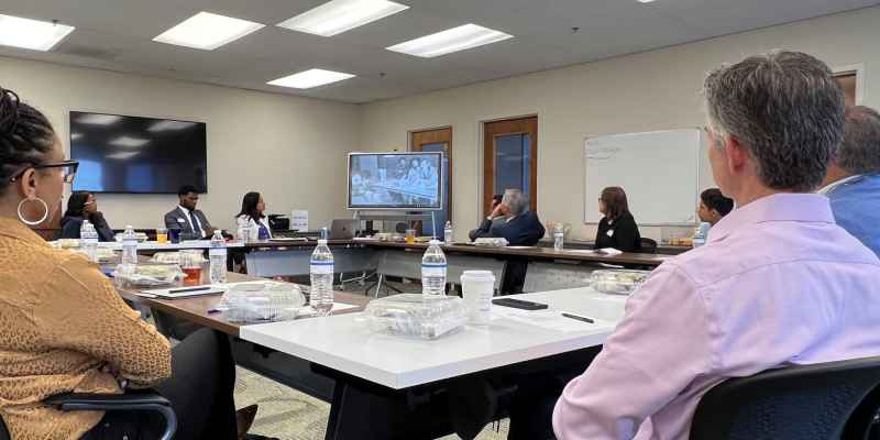 Members of Leadership Atlanta watching an ACLU of Georgia history video