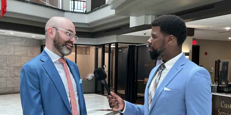 Chris Bruce interviewing lawyer during Law Day 2025