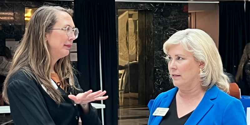 ACLU staffer interacting with lawmaker during Law Day 2025