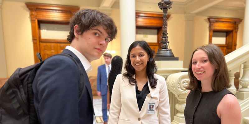 ACLU of Georgia staffer and interns at capitol on Sine Die 2025