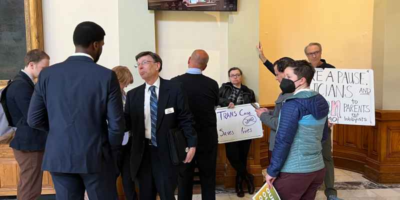 LGBTQ+ allies at the Georgia state capitol reacting to the passage of Senate Bill 140 on March 21, 2023