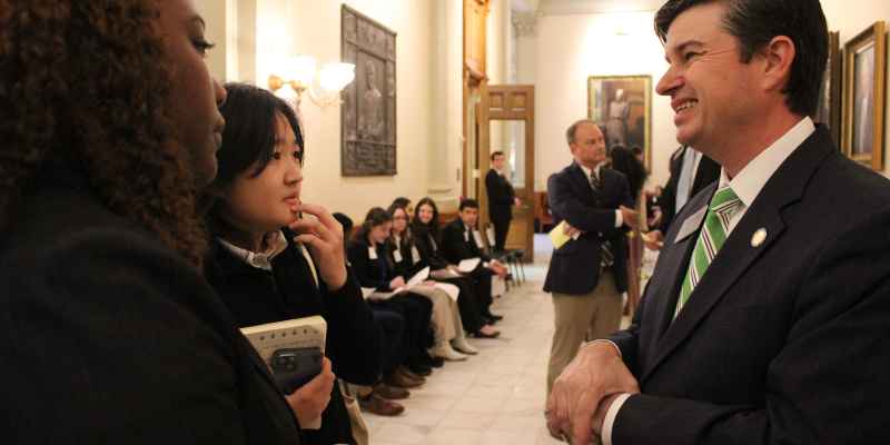 Students speaking with Sen. Matt Brass on Student Lobby Day