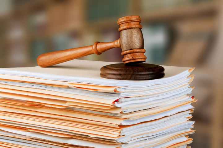 stack of bills with gavel