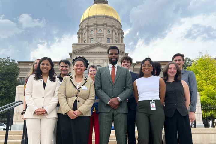 ACLU of Georgia's policy team photographed in front of the capitol