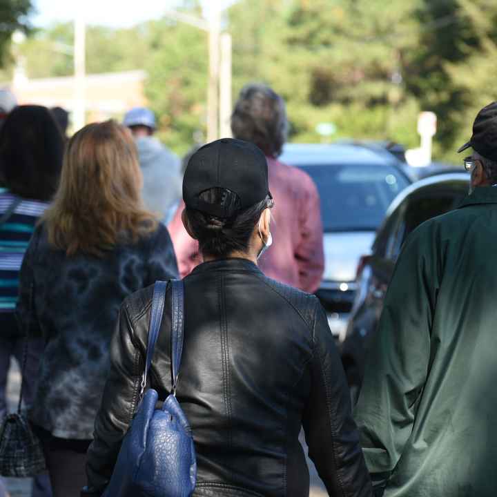 people waiting in line to vote