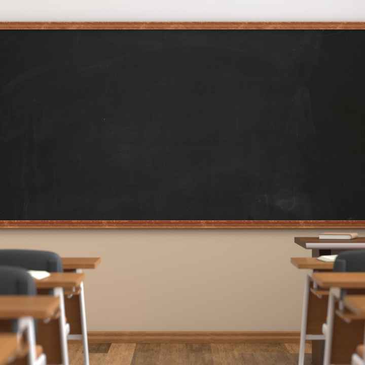 classroom with desks facing chalkboard