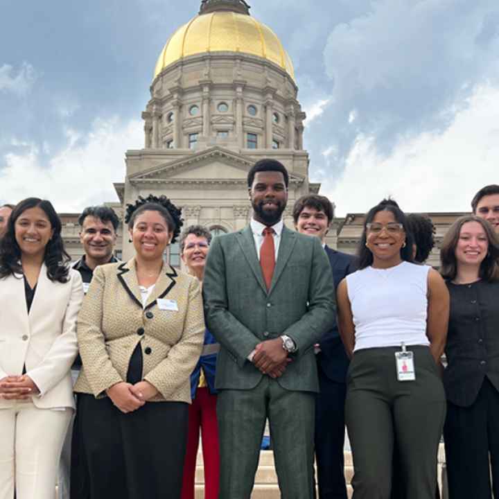 ACLU of Georgia's policy team photographed in front of the capitol