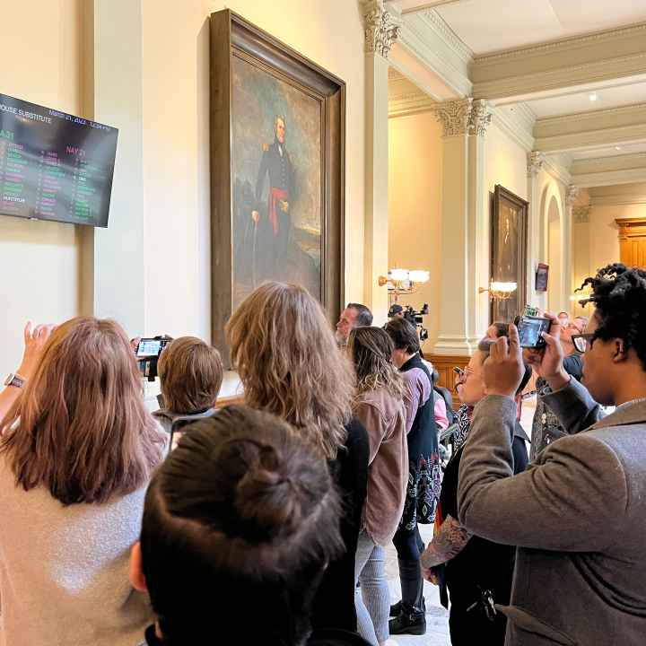 LGBTQ+ allies at the Georgia state capitol reacting to the passage of Senate Bill 140 on March 21, 2023